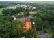 Aerial view of new homesites surrounded by lush trees, highlighting a private, neighborhood setting and nearby amenities at 2530 Elkwood Cir, Charlotte, NC 28205