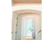 Entryway with arched doorway and white trim provides natural light in this newly built home at 2530 Elkwood Cir, Charlotte, NC 28205