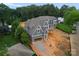 New construction showing modern craftsman style exterior with gray siding, and an attached two-car garage at 2530 Elkwood Cir, Charlotte, NC 28205