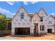 New construction home showing the frame and Tyvek wrap against blue sky at 2530 Elkwood Cir, Charlotte, NC 28205