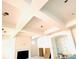 Bright, unfinished living room with coffered ceilings and a fireplace at 2530 Elkwood Cir, Charlotte, NC 28205