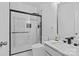 Modern bathroom with a glass-enclosed shower and a sleek vanity with updated fixtures at 3008 Dundee Ln, Fort Mill, SC 29707