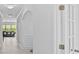 Bright hallway with white walls, arched doorways, and modern lighting fixtures at 3008 Dundee Ln, Fort Mill, SC 29707