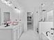 A luxurious main bathroom with dual sinks, a glass shower and a walk-in closet at 3008 Dundee Ln, Fort Mill, SC 29707