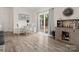 Bright breakfast nook with a white table, bench seating, and sliding glass doors to the backyard at 3038 Lydney Cir, Waxhaw, NC 28173