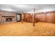 Basement rec room with a fireplace, wood accents, and wet bar at 3087 E Nc Hwy 150 Hwy, Lincolnton, NC 28092