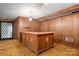 Basement featuring a wooden bar and a door with a decorative diamond pattern window at 3087 E Nc Hwy 150 Hwy, Lincolnton, NC 28092