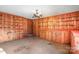 Bonus room with wood paneling, built-in shelves, and carpet flooring at 3087 E Nc Hwy 150 Hwy, Lincolnton, NC 28092