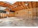 Spacious unfinished garage with exposed rafters and natural light at 3087 E Nc Hwy 150 Hwy, Lincolnton, NC 28092