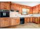 Eat in kitchen featuring wood cabinetry, modern appliances, and bright countertops at 3087 E Nc Hwy 150 Hwy, Lincolnton, NC 28092