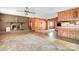 Cozy living room with a brick fireplace and wood paneled walls, exuding warmth and charm at 3087 E Nc Hwy 150 Hwy, Lincolnton, NC 28092