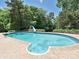 Backyard pool with slide and landscaping for summer fun at 3600 Carmel Rd, Charlotte, NC 28226