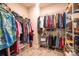 A well-organized walk-in closet with ample shelving and hanging space for clothes and accessories at 3624 County Down Ave # 5-14, Kannapolis, NC 28081