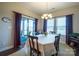 Inviting dining room featuring access to outdoor patio, complemented by neutral decor at 3624 County Down Ave # 5-14, Kannapolis, NC 28081