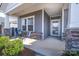 Inviting front porch featuring cozy seating, perfect for relaxing and enjoying the outdoors at 3624 County Down Ave # 5-14, Kannapolis, NC 28081
