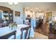 Open-concept kitchen with island seating and stainless steel appliances, open to dining area at 3624 County Down Ave # 5-14, Kannapolis, NC 28081