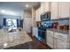 Well lit kitchen featuring stainless steel appliances and granite countertops at 3624 County Down Ave # 5-14, Kannapolis, NC 28081