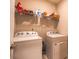 Functional laundry room with modern appliances, including a washer and dryer at 3624 County Down Ave # 5-14, Kannapolis, NC 28081