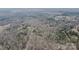 A stunning aerial view of a wooded property offering privacy and seclusion at 369 Falcon Dr, Concord, NC 28025