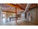 Unfinished basement with exposed beams and ductwork offers potential for customization at 369 Falcon Dr, Concord, NC 28025