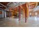 Unfinished basement with exposed beams and ductwork offers potential for customization at 369 Falcon Dr, Concord, NC 28025