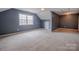 Large bonus room with lots of natural light at 369 Falcon Dr, Concord, NC 28025