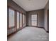 Bright bedroom with carpet and large windows offering plenty of natural light at 369 Falcon Dr, Concord, NC 28025