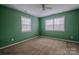 Bedroom with carpet, natural light from windows, and ceiling fan at 369 Falcon Dr, Concord, NC 28025