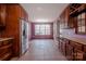 Gourmet kitchen with stainless steel refrigerator and built-in wine rack at 369 Falcon Dr, Concord, NC 28025