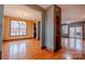 Open-concept living space featuring rich hardwood floors and generous natural light at 369 Falcon Dr, Concord, NC 28025