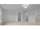 Carpeted bedroom with adjacent closet and bathroom at 4109 Walking Ridge Rd # 57, Charlotte, NC 28208