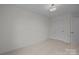 Cozy bedroom featuring neutral carpeting and a ceiling light at 4109 Walking Ridge Rd # 57, Charlotte, NC 28208