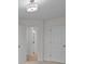View of the bedroom hallway looking into the bathroom at 4109 Walking Ridge Rd # 57, Charlotte, NC 28208