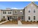 Charming townhome with stone accents, modern windows and lovely front yard at 4109 Walking Ridge Rd # 57, Charlotte, NC 28208