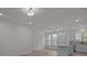 Open-concept living area with kitchen island and plenty of natural light at 4109 Walking Ridge Rd # 57, Charlotte, NC 28208