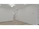 Large living room with recessed lighting adjacent to a staircase at 4109 Walking Ridge Rd # 57, Charlotte, NC 28208