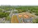 New construction homes with garages line a street in a community near Charlotte's skyline at 4113 Walking Ridge Rd # 56, Charlotte, NC 28208