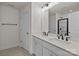 Bathroom features double sinks, large mirror, and tile flooring at 4113 Walking Ridge Rd # 56, Charlotte, NC 28208