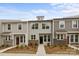 Charming townhome with stone accents and well-maintained landscaping at 4113 Walking Ridge Rd # 56, Charlotte, NC 28208