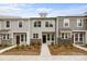 Inviting townhome showcasing a meticulously manicured front yard at 4113 Walking Ridge Rd # 56, Charlotte, NC 28208