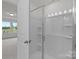 Well-lit bathroom featuring a glass-enclosed shower and contemporary fixtures at 4117 Walking Ridge Rd # 55, Charlotte, NC 28208