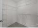 Ample walk-in closet equipped with shelving at 4117 Walking Ridge Rd # 55, Charlotte, NC 28208