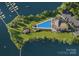 Aerial view of community amenities with pool, marina, clubhouse, and waterfront access at 4465 Morning Mist Dr # 54, Sherrills Ford, NC 28673