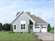 Charming two-story home boasts a two-car garage, manicured lawn, and classic design at 4465 Morning Mist Dr # 54, Sherrills Ford, NC 28673
