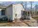 Backyard brick patio with a screened-in porch at 457 Birchwood Ne Trl, Concord, NC 28025