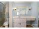 Powder blue bathroom features a toilet, vanity, and shower at 457 Birchwood Ne Trl, Concord, NC 28025