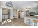 Spacious kitchen with breakfast bar and access to laundry and workstation, providing convenience and functionality at 457 Birchwood Ne Trl, Concord, NC 28025