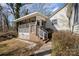 Exterior view of the screened-in porch with brick and lattice details at 457 Birchwood Ne Trl, Concord, NC 28025