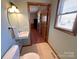 This bathroom has a sleek, modern design with a stylish sink and neutral-colored walls at 4866 E Nc Hwy 150 Hwy, Lincolnton, NC 28092