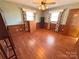Bedroom with hardwood floors, a ceiling fan, and wood trim at 4866 E Nc Hwy 150 Hwy, Lincolnton, NC 28092